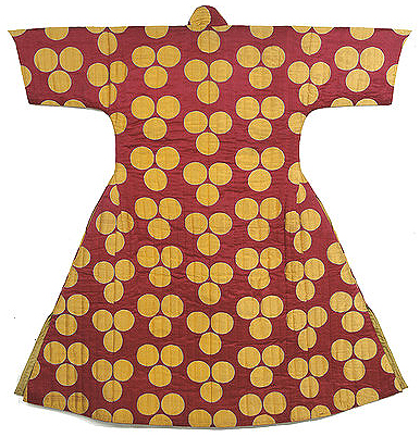 red kaftan with large yellow dots