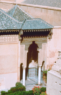 Entrance to pink stucco Maghribi home